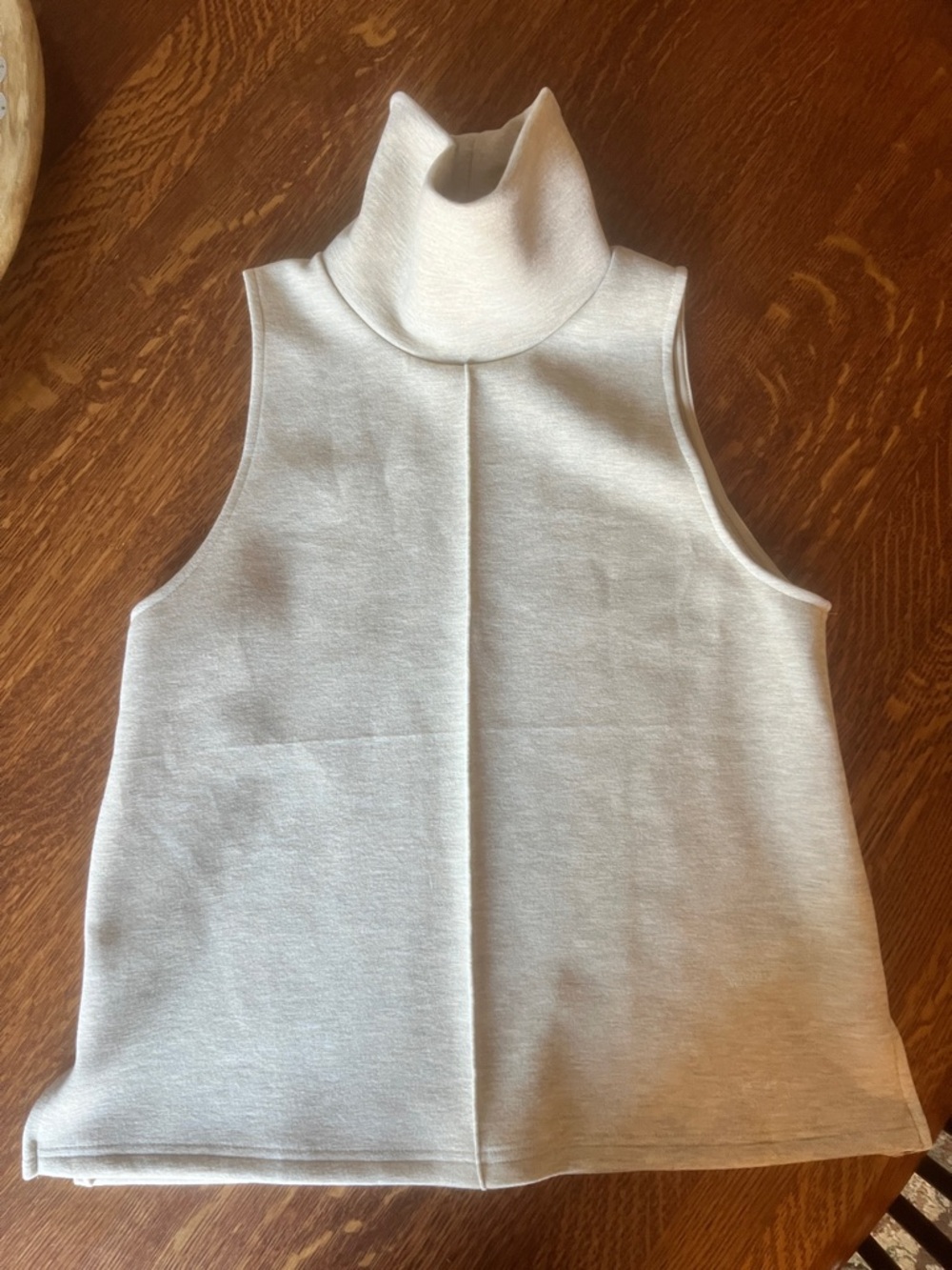 OGL Sleeveless Turtleneck Top in Light Cream
